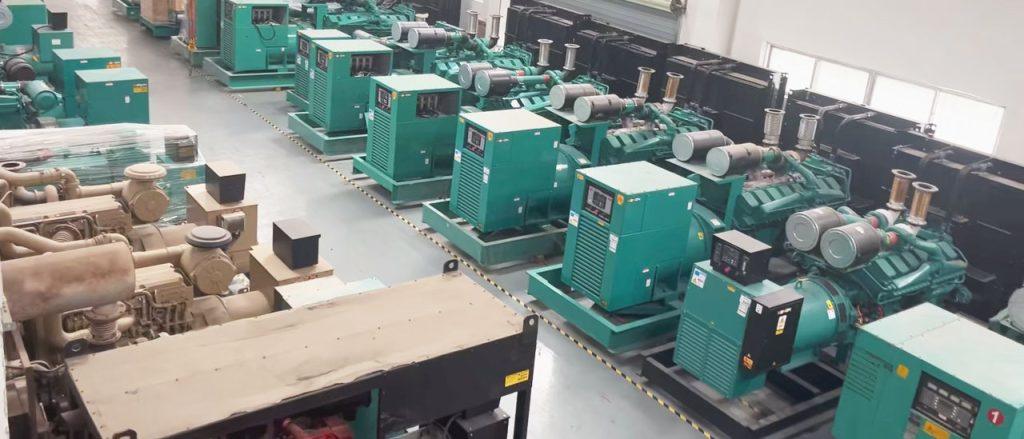 Refurbished Cummins diesel generator sets lined up on factory floor